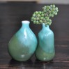 Three little green ceramic Vases